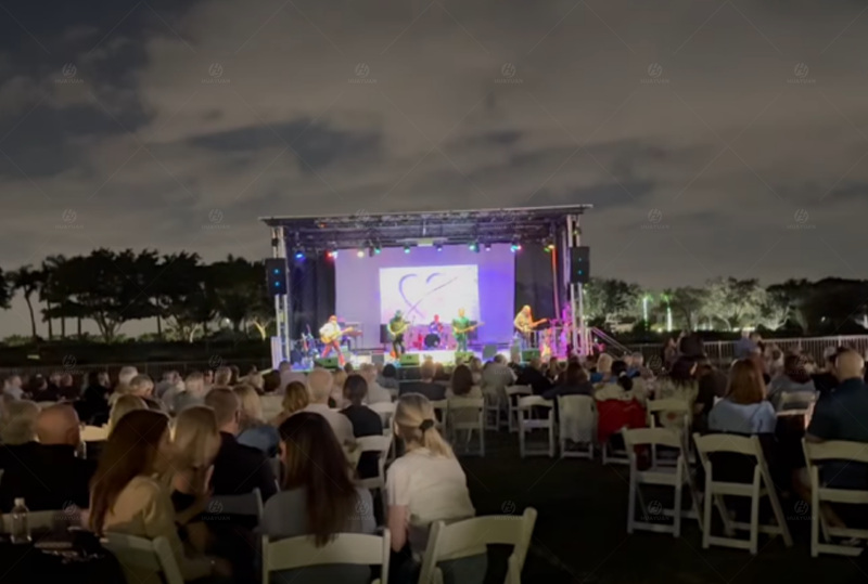 The ST345S mobile stage trailer completed the lighting truss and sound setup for a large-scale outdoor music performance in Boca Raton, USA.